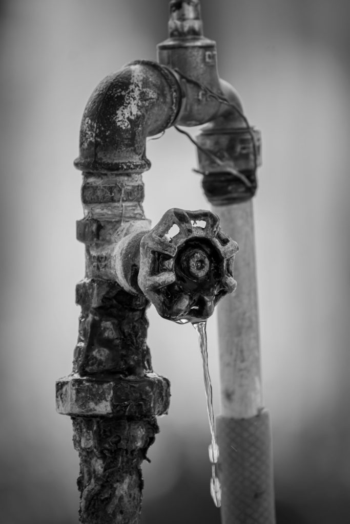Corroded tap valve dripping water